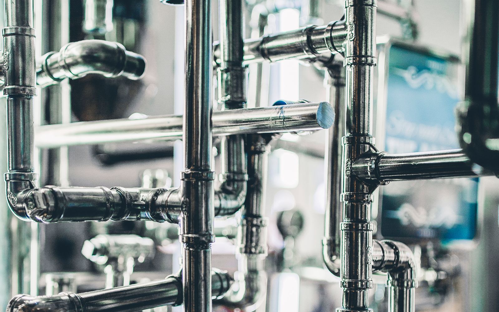 A dense network of steel pipework, joints and junctions